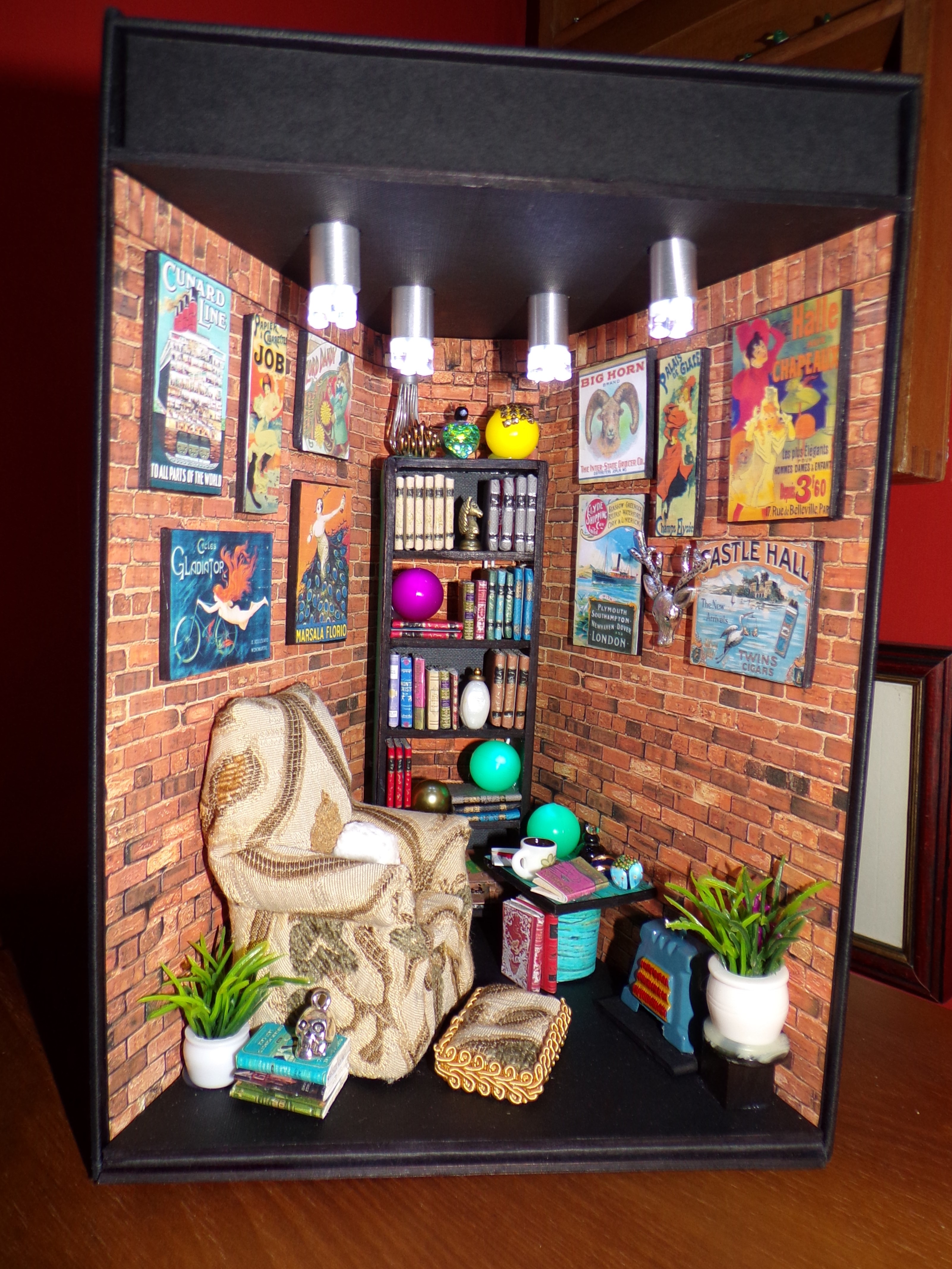 …Bookshelf art. Book Nook. Bookshelf insert. LED fairy lights. Cosy chair in brick wall library ...